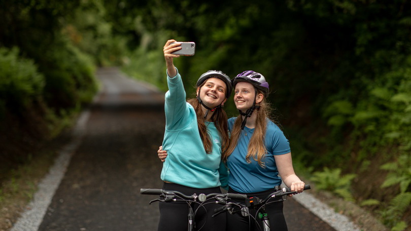 Delam Carter and Family from Caherdavin, Limerick cycling and walking The Limerick Greenway at Fergusons viaduct. Photograph: Sean Curtin True Media.