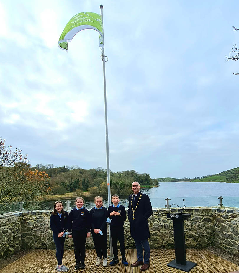 Mayor Raises the Green Flag at Lough Gur.