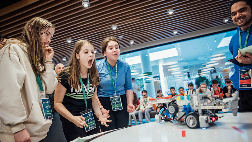 Tara, Vivienne and Neasa from Our Lady's Abbey, Adare willing their robot to stay in the ring as over 100 primary school students went to battle with their custom-designed sumo wrestling robots at the 9th annual Analog Devices Primary School Robotics Competition. Photo: Brian Arthur