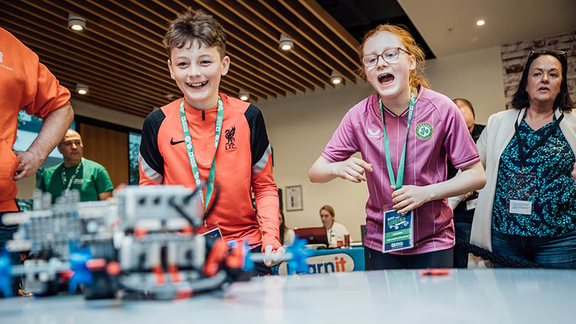 Aran and Leanna from Scoil Muire, Broadford cheering on their robot at the 9th annual Analog Devices Primary School Robotics Competition. Photo: Brian Arthur