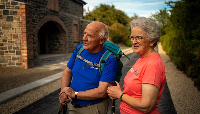 Older couple walking on Limerick Greenway