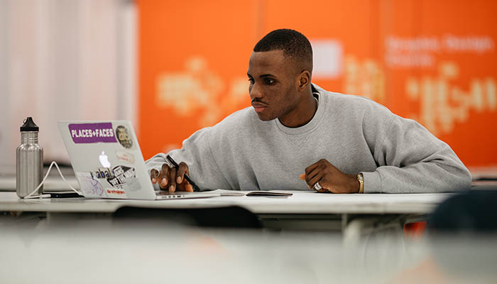 Limerick School of Art and Design Student at a desk looking at a laptop